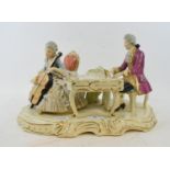 A Dresden porcelain group, of a pianist and a cellist, 21 cm high Report by NG Cellist bow has