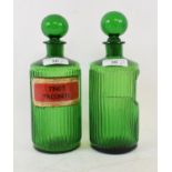 A pair of green glass apothecary bottles and stoppers, 21 cm high, and other similar items (box)