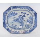 A Chinese porcelain plate, decorated a landscape in underglaze blue, 41.5 cm wide Report by NG Crack