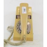 A GPO "Trimphone" telephone, designed by Rowlands, with electronic ringer, "tweet" and illuminated