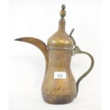 An Islamic brass coffee pot, 32 cm high