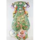 An Ironstone China style vase and cover, with dragon handles, damages, loss and repairs, 67 cm high