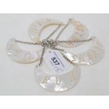Five mother of pearl decanter labels