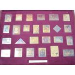 The Empire Collection: a set of 25 silver gilt facsimile stamps, boxed