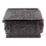 A carved oak bible box, of small proportions, decorated masks and bears date 1616, 30.5 cm wide