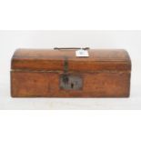 A 19th century embossed leather covered dome top trunk, 30 cm wide