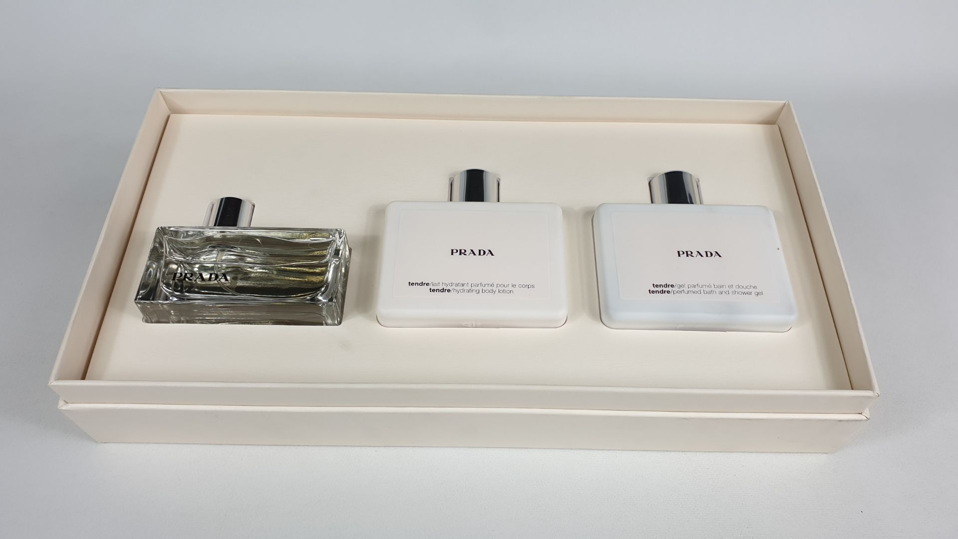 6 X PRADA GIFT SETS EACH SET CONTAINS 100 ML BODY LOTION, 100 ML SHOWER GEL, 50 ML EDP SPRAY