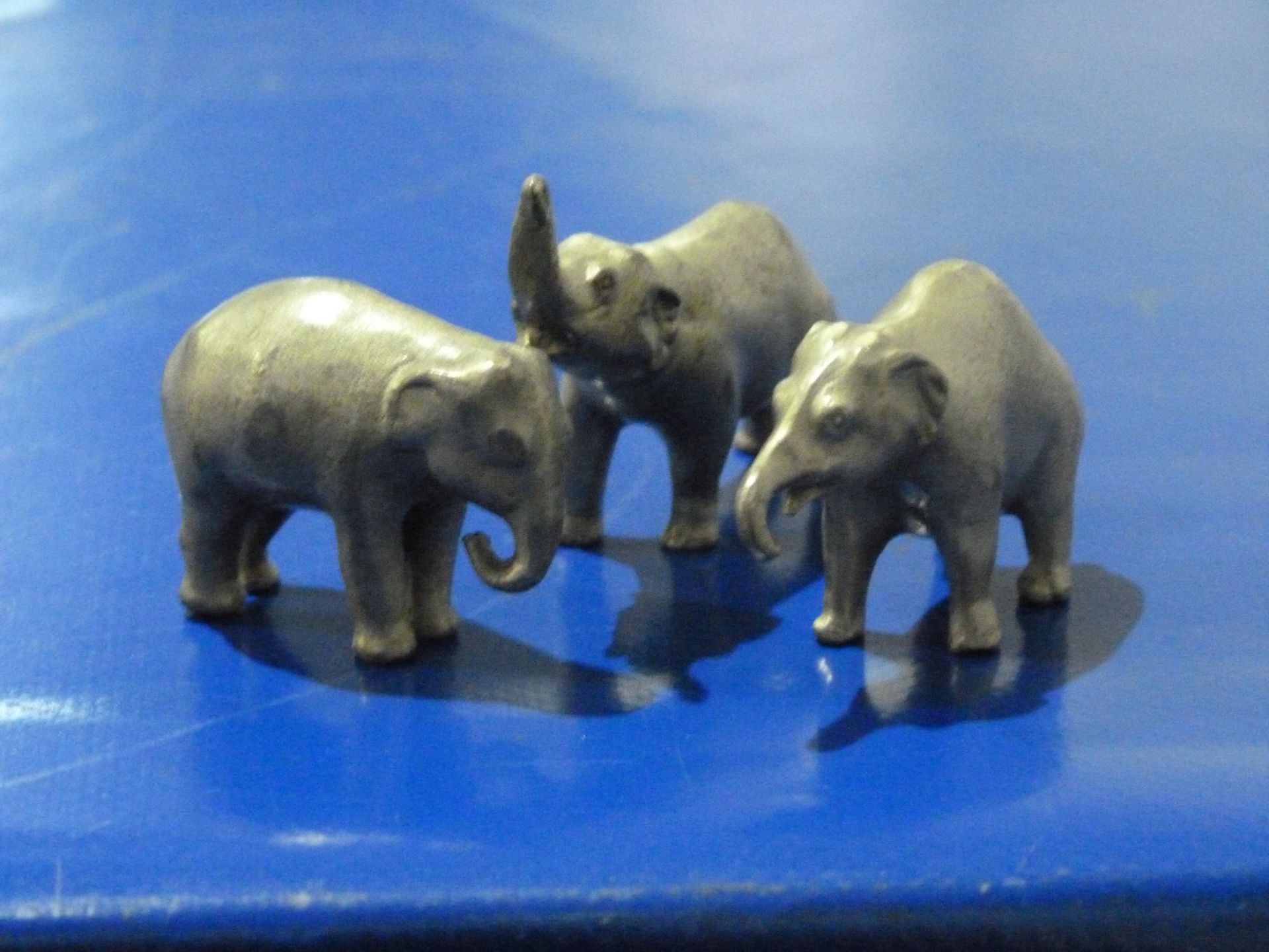 Three 'Selangor Pewter' Elephants (Boxed) (Est. £20-£30)