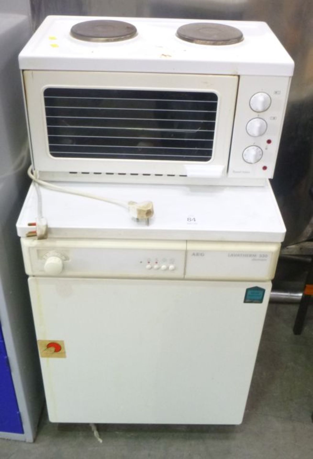 An AEG Lavatherm 330 Dryer c/w Russell Hobbs Microwave. Please note there is a £5 plus Vat lift