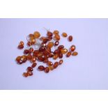 This is a Timed Online Auction on Bidspotter.co.uk, Click here to bid. Faceted Amber Beads approx