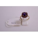 This is a Timed Online Auction on Bidspotter.co.uk, Click here to bid. A 9ct Gold Ring with Iolite