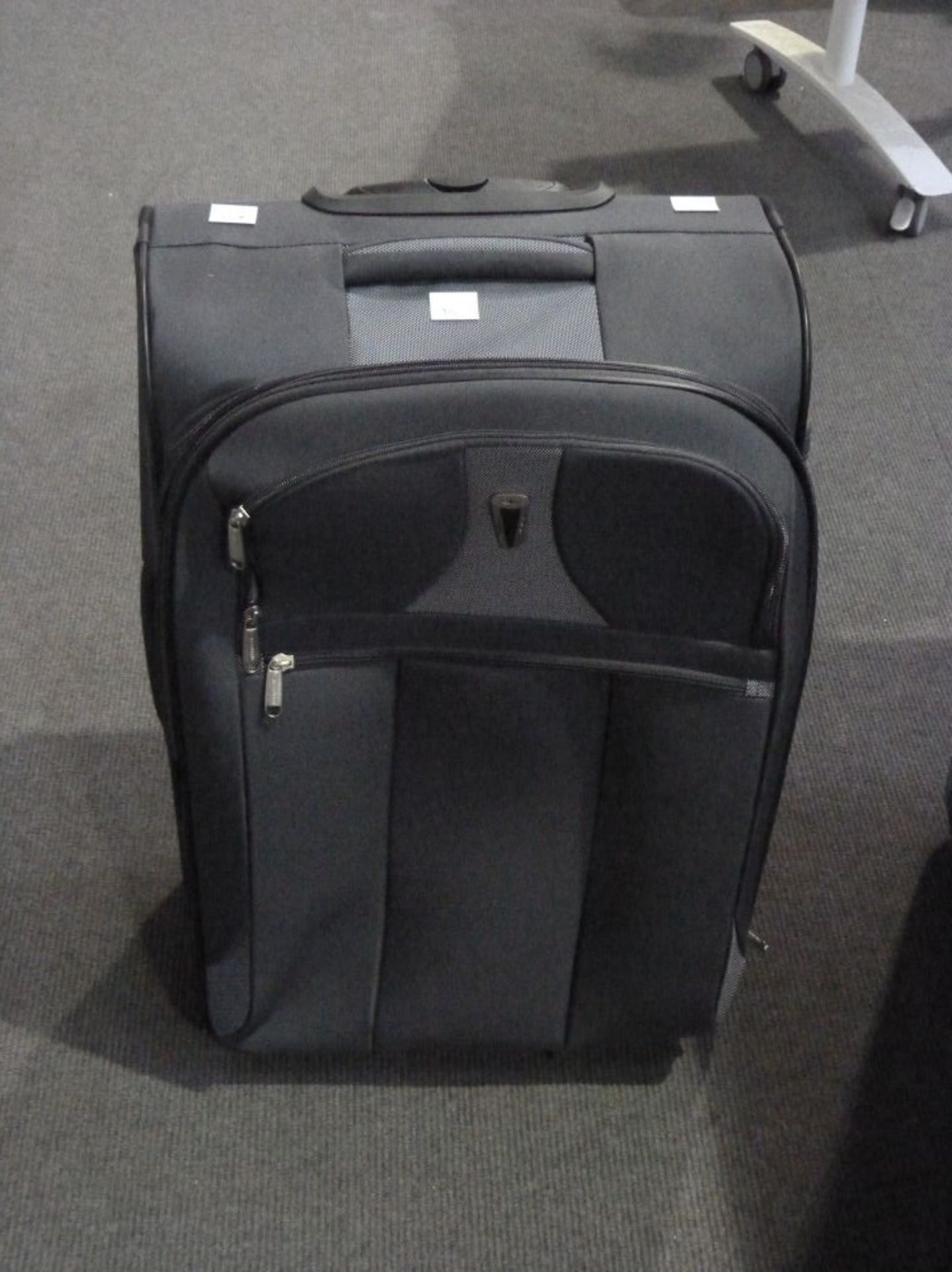 A Portland Soft Shell Luggage Case. (est. £10-£20)