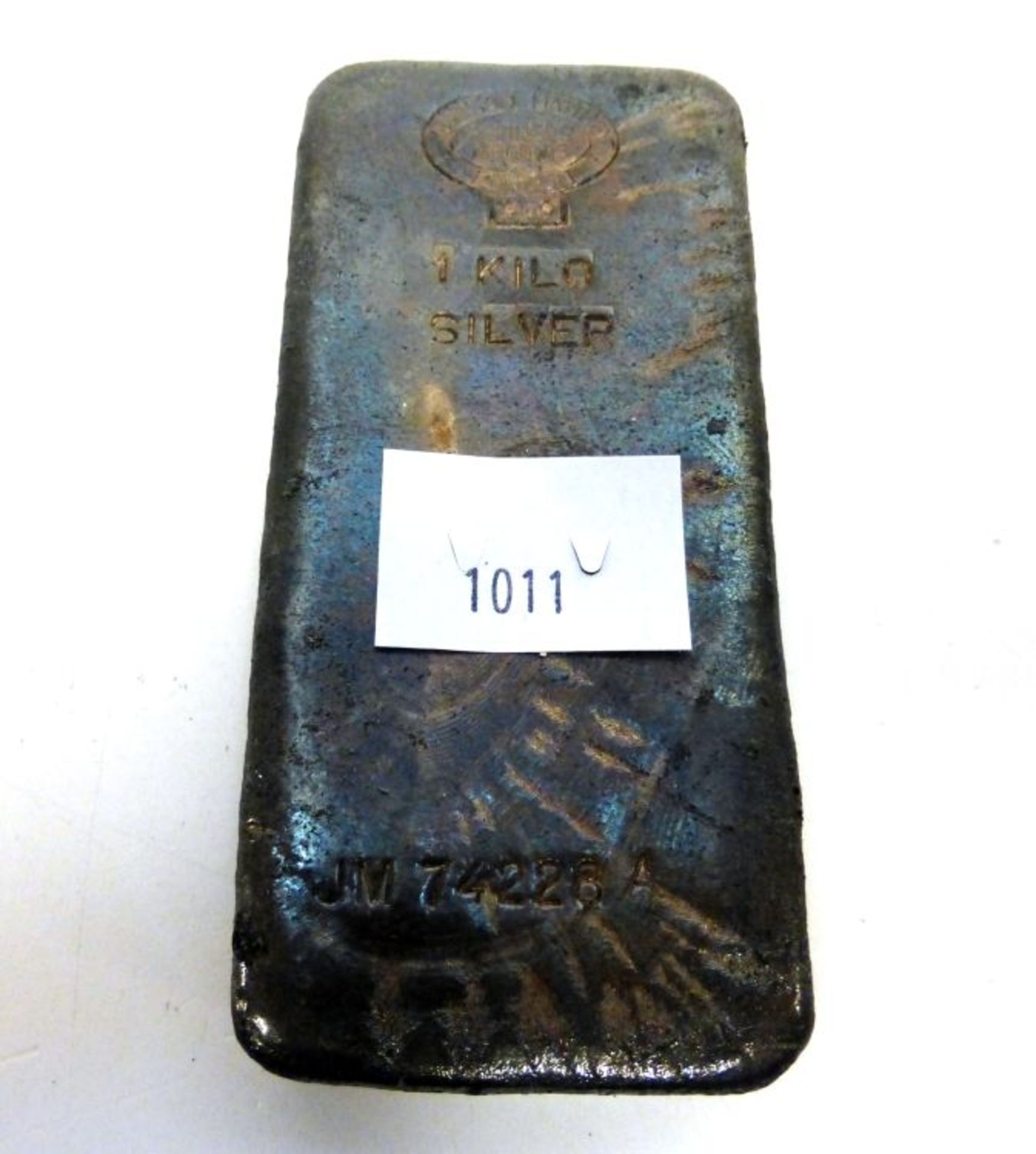 A Johnson Matthey 1 Kilo Silver (0.999) Ingot (JM 74228A) (est. £300-£600)