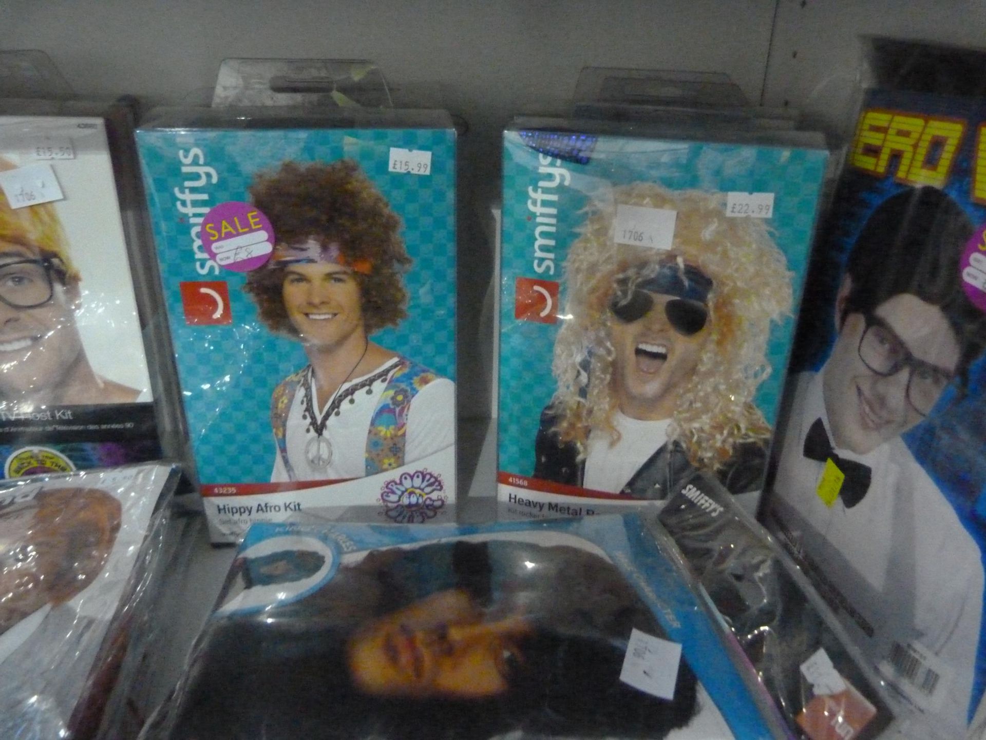 2 x shelves of Mens Fancy Dress Wigs New to include Nerd Wig, 3 x 80's Rocker Wig Kits, 2 x Hippy - Image 2 of 6