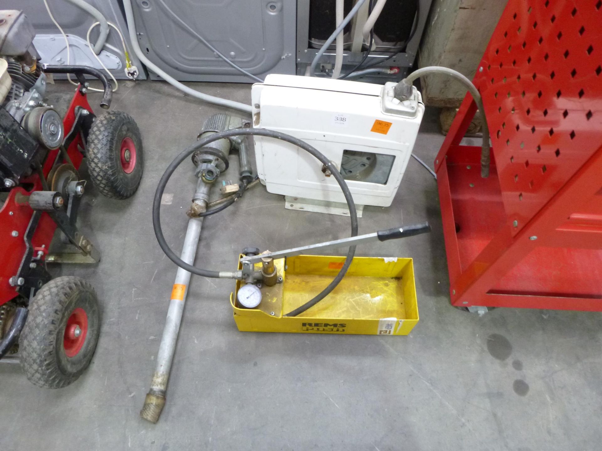 A Retractable Air Line, a 240V Barrel Pump and a Rems Hydraulic Tester