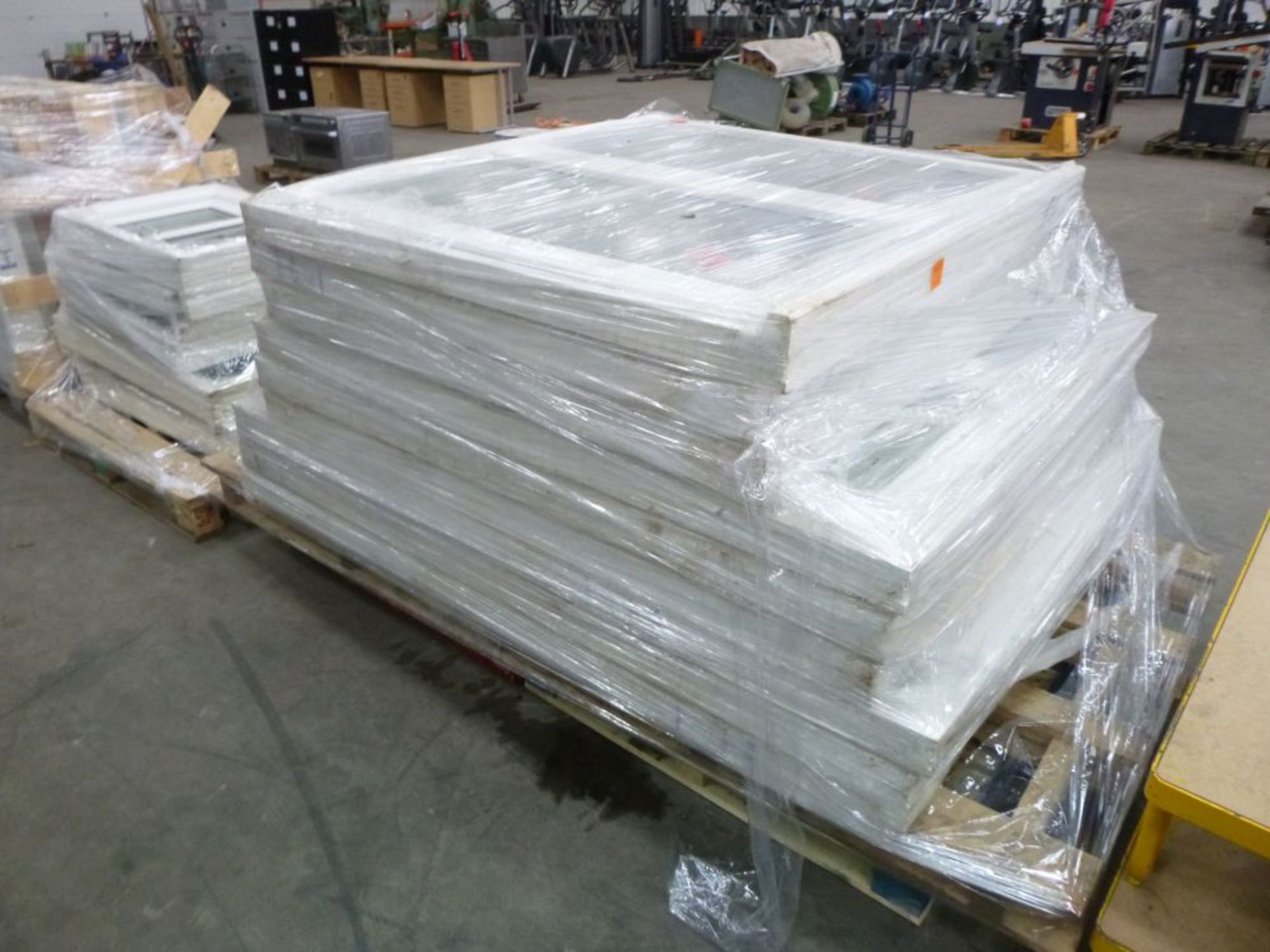 * 9 New and Unused High Quality Glazed Wooden Windows. A Pallet of 9 New and Unused High Quality