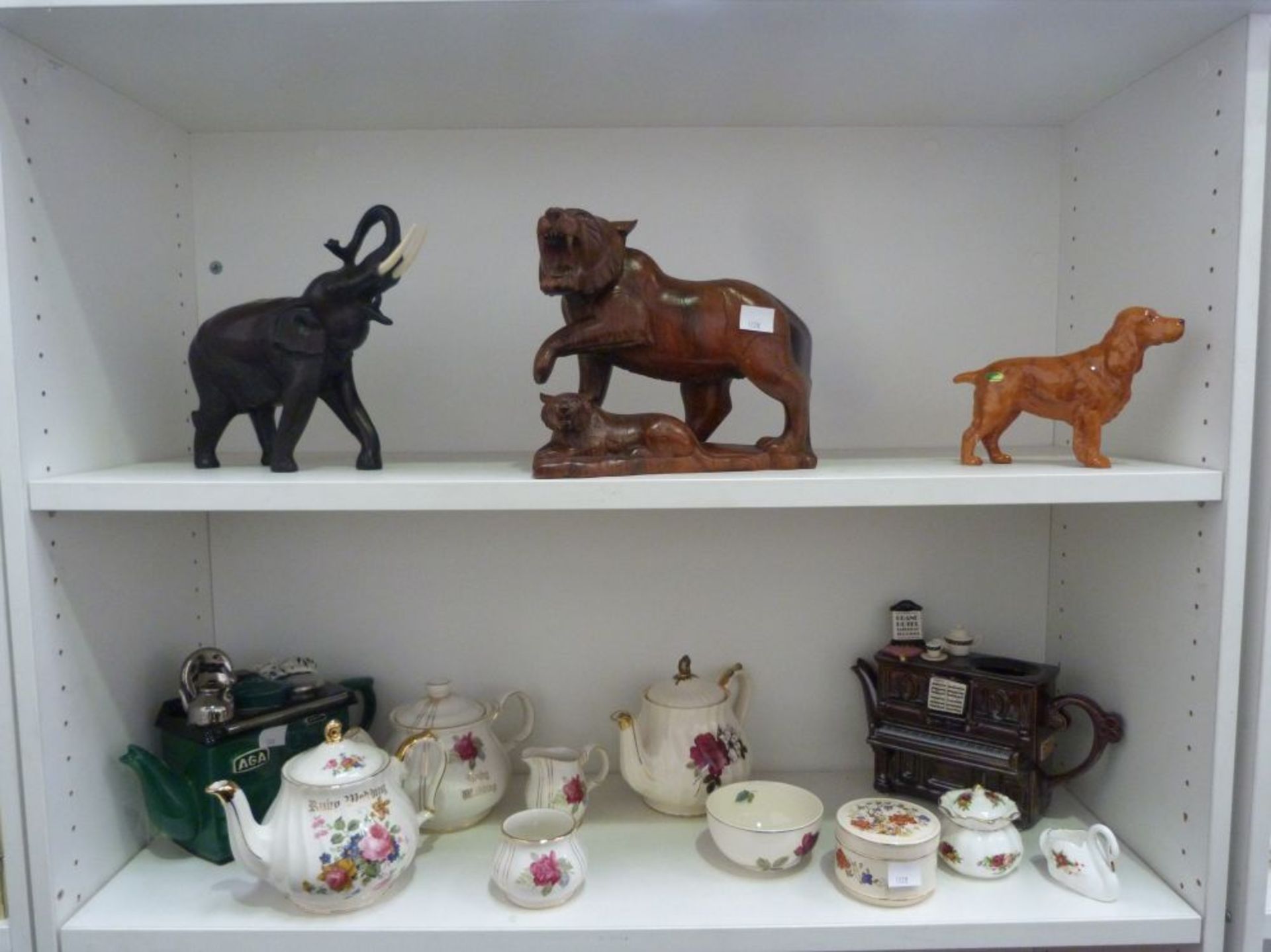 Four shelves to contain a Beswick Dog (A/F), Elephant Figurine, wooden Tiger Figurine, Royal Albert