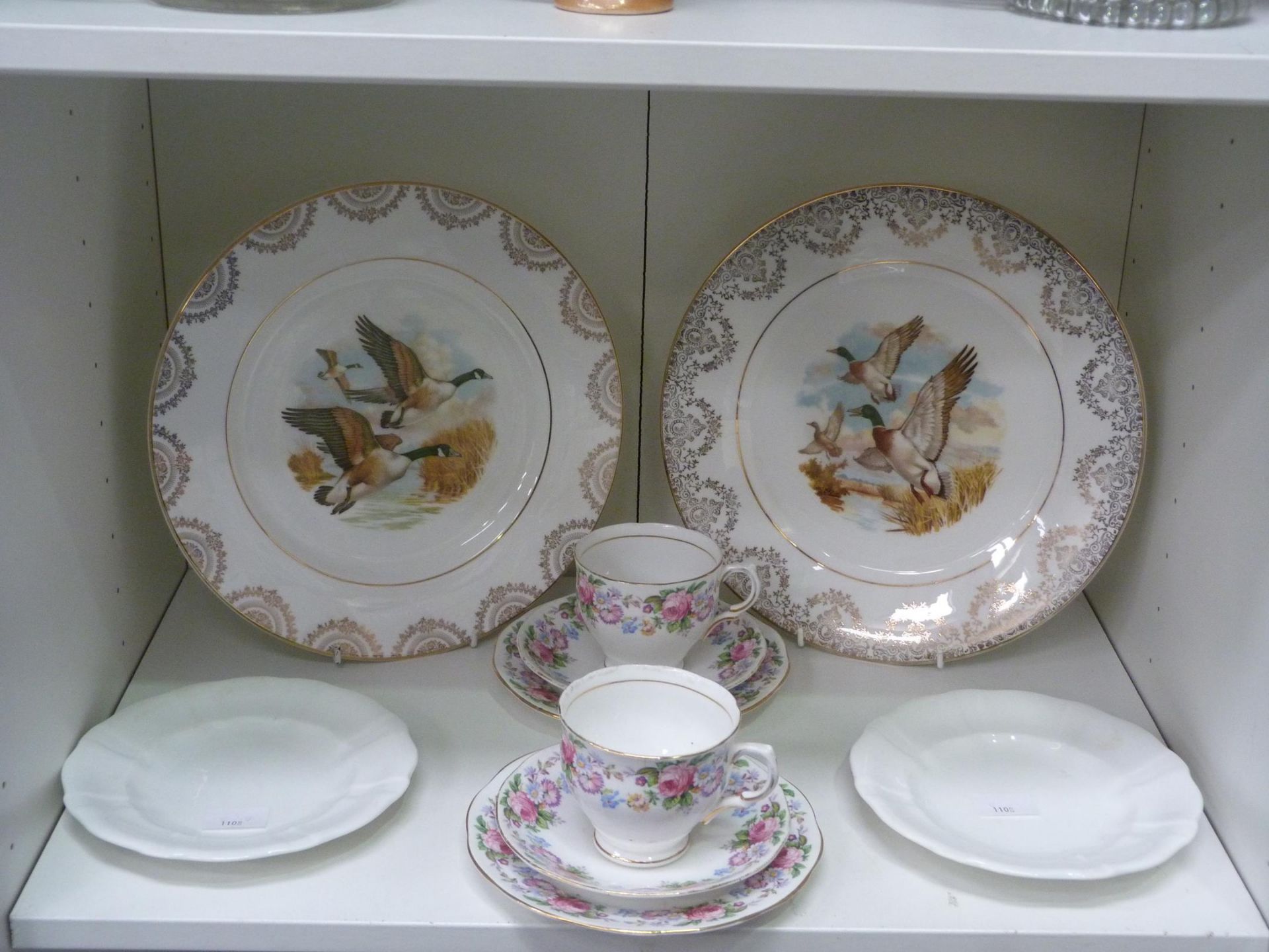 Two shelves to contain an assortment of ceramics including two Royal Crown Derby Plates,