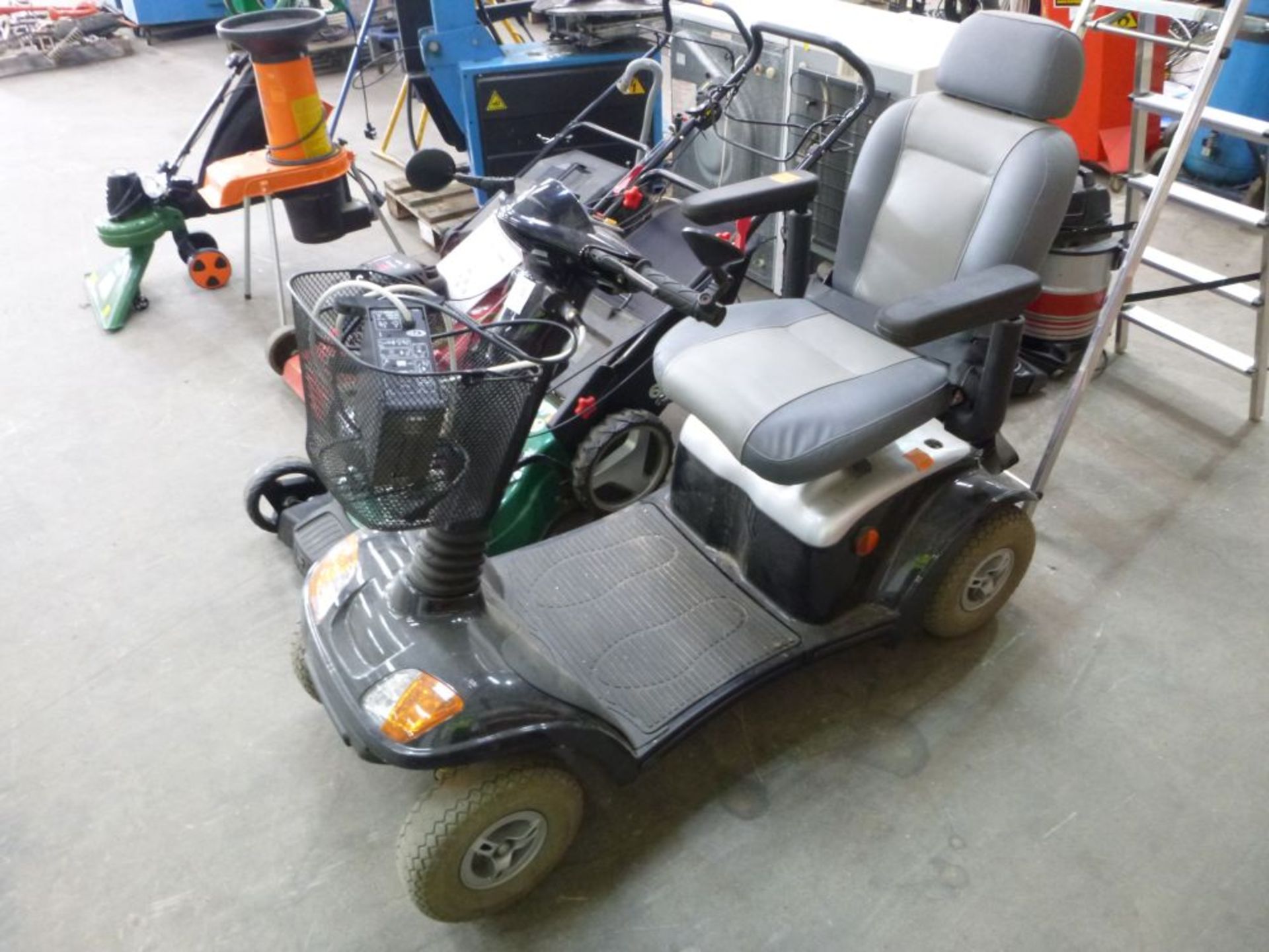 A Kymco Mobility Scooter rated at 8 MPH complete with Charger. Please note there is a £5 plus VAT
