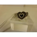 This is a Timed Online Auction on Bidspotter.co.uk, Click here to bid. Silver Diamond set heart