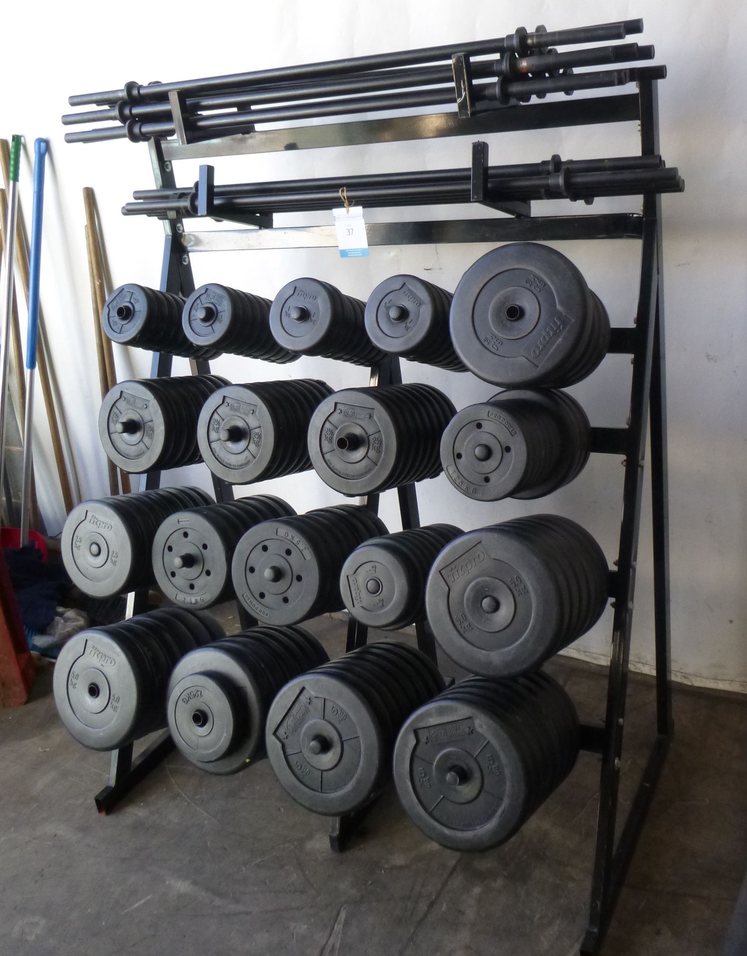 * A Body Bar Set to include rack and bars and weights. - Image 3 of 4