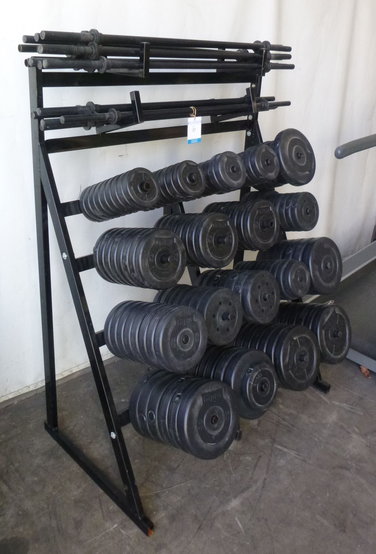 * A Body Bar Set to include rack and bars and weights. - Image 2 of 4