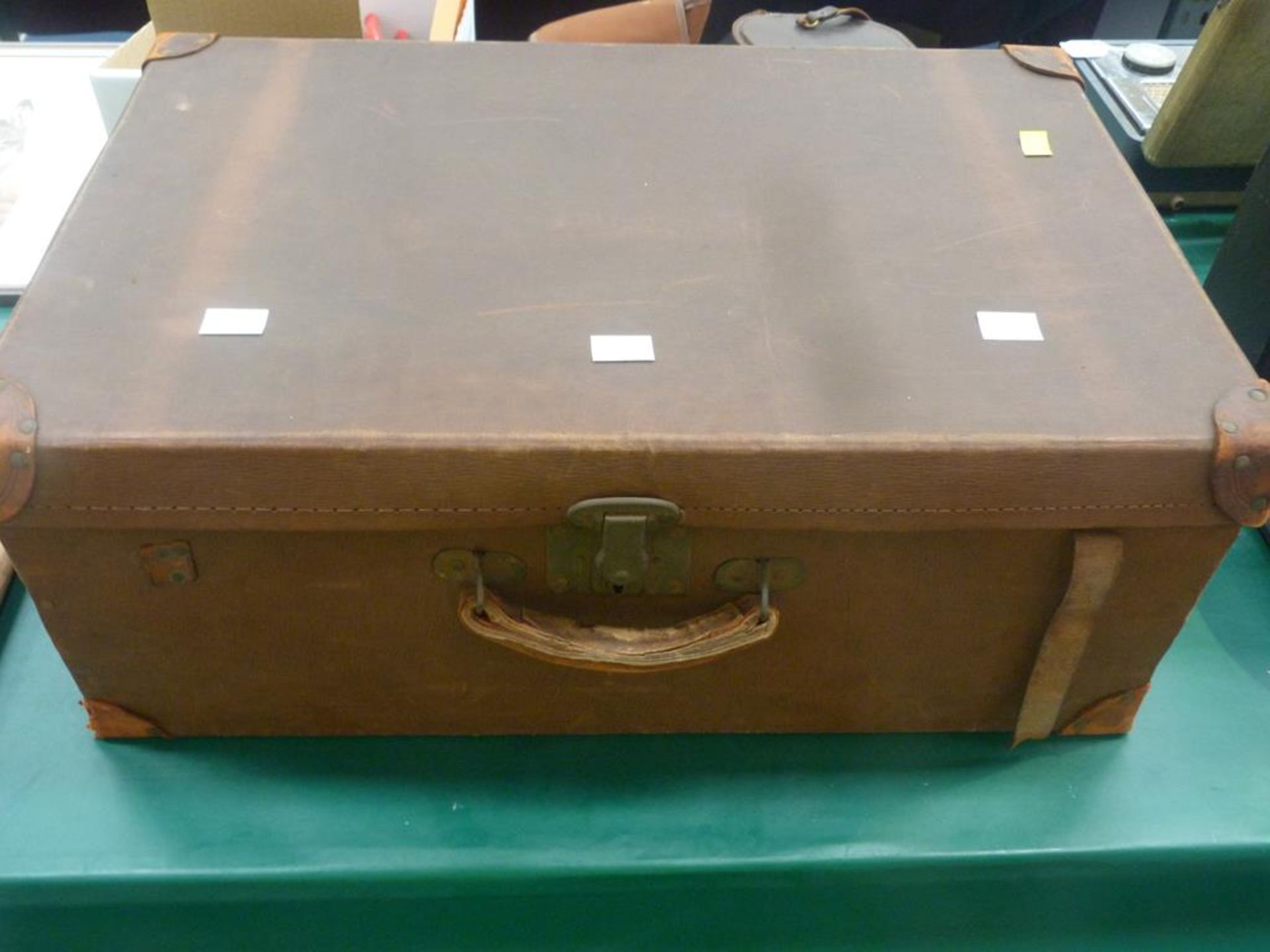 An Early Trunk Suitcase with Reinforced Corners (H21cm, W62cm, D42cm) (Est.£20-£40)