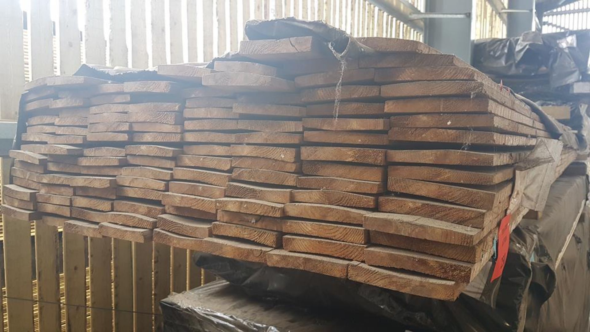 * 14x125 sawn thermowood D grade. 120 pieces at 4800mm. 49255BB. Please note this lot is located