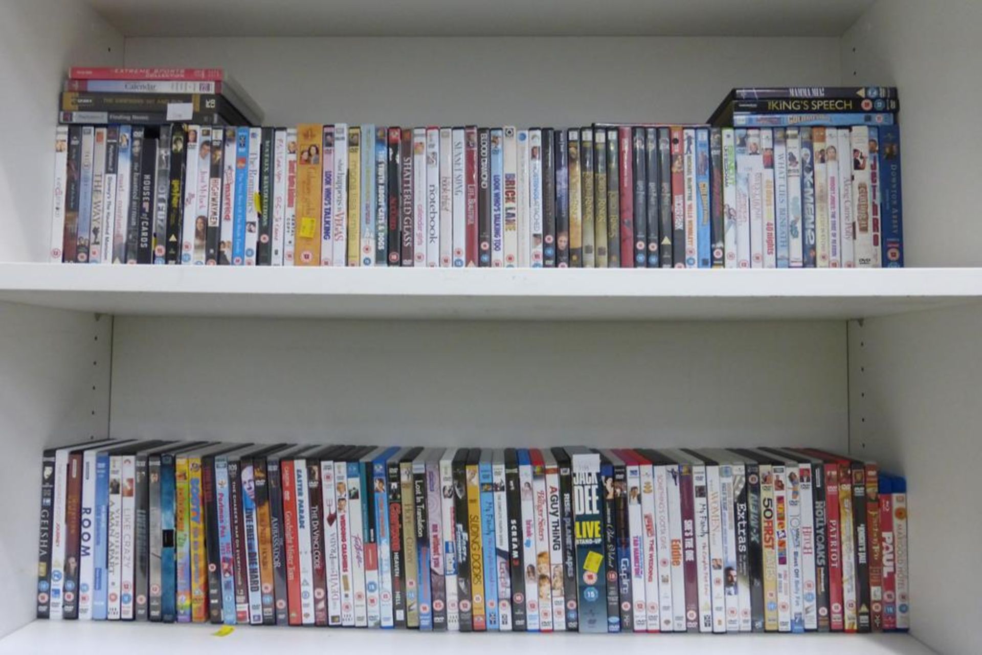 Over one hundred DVDs with a range of titles to include Harry Potter, The Lord of The Rings, Die