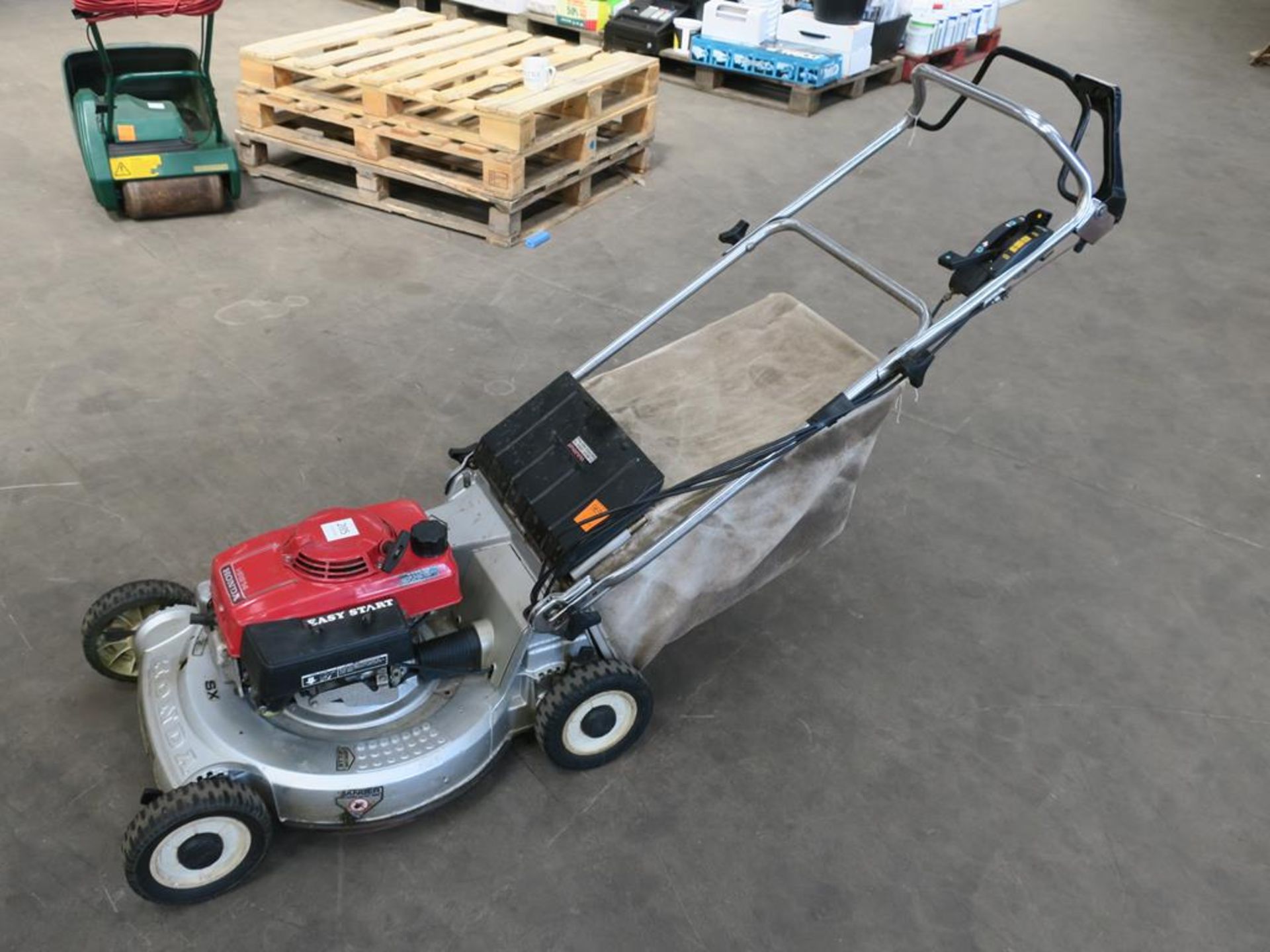 A Honda HR214 21'' self drive Mower