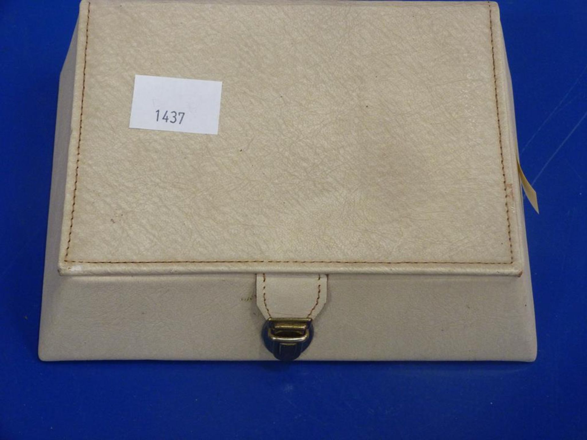 A Cream Coloured Leather Jewellery Box which contains predominantly Vintage Jewellery with some Gold