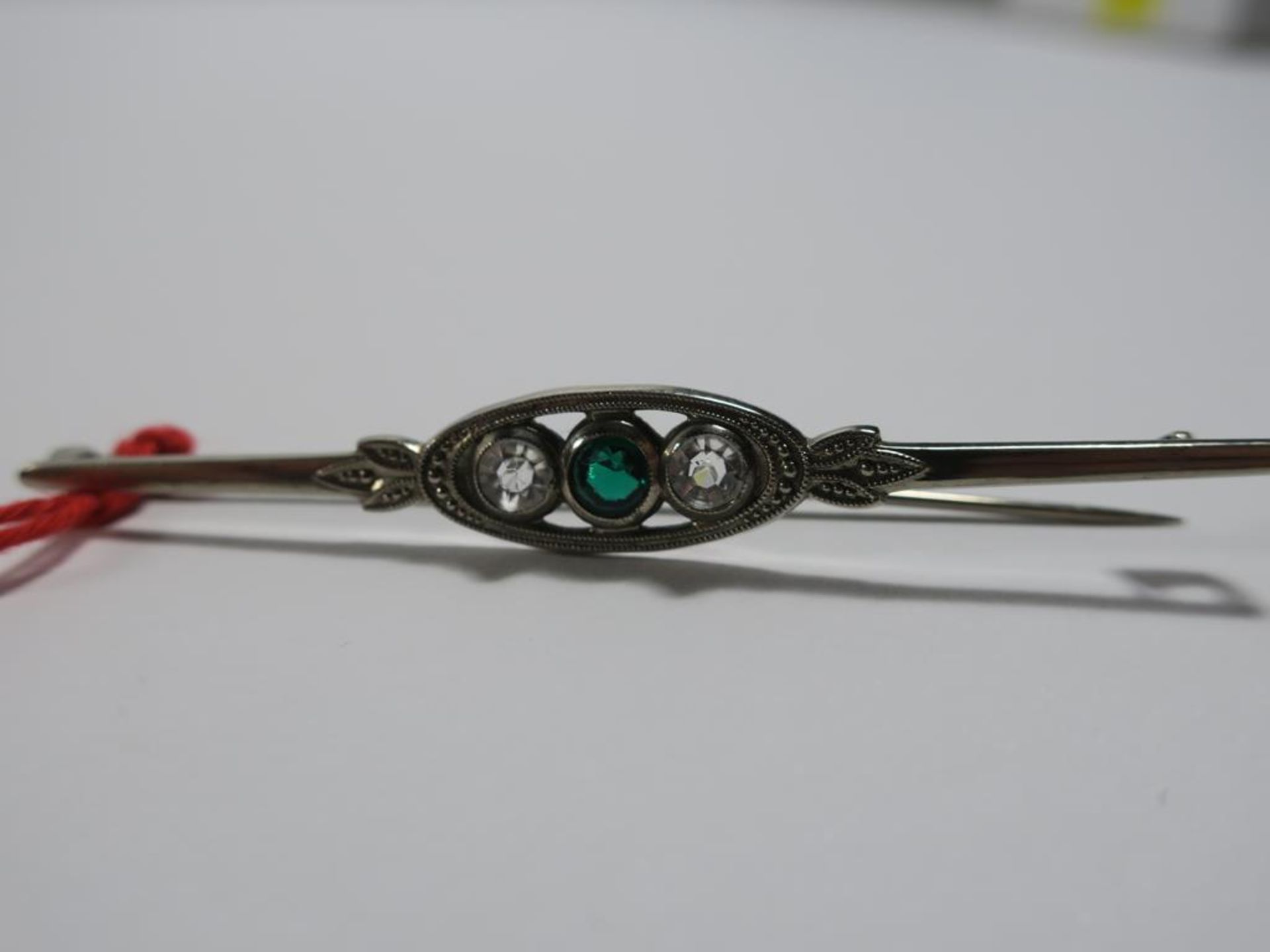 Silver? Pin with two clear stones and one green stone, approx 3.6g, Silver? matchbox with chased - Image 3 of 8