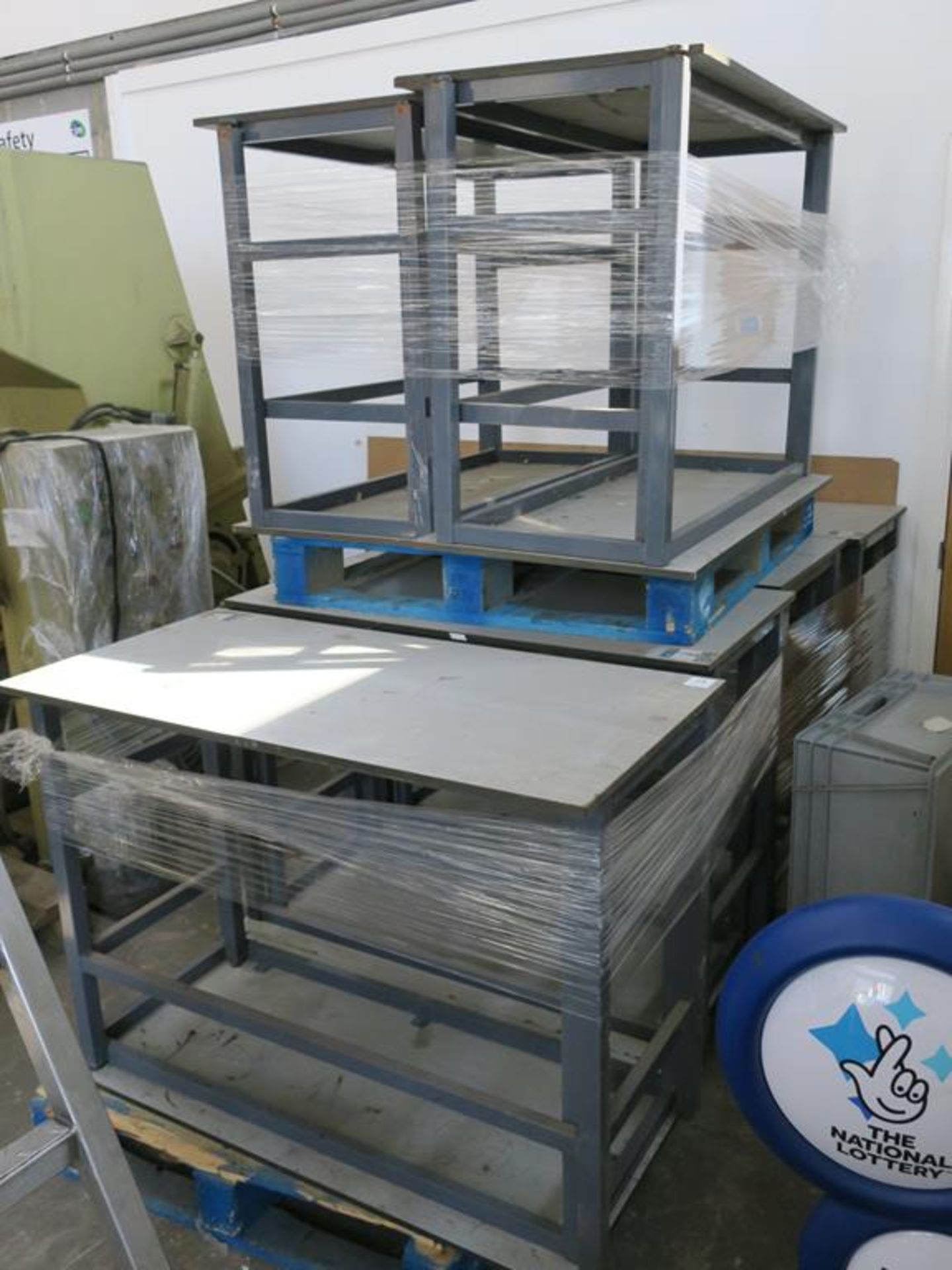 12 x Metal Framed Work Tables. Please note there is a £10 Plus VAT Lift Out Fee on this lot