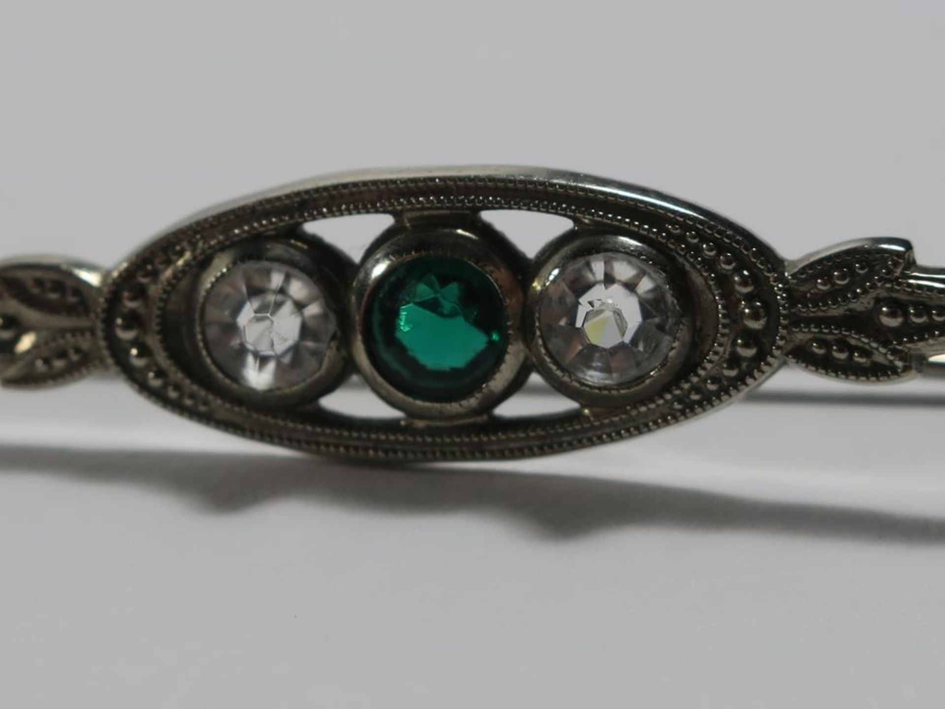Silver? Pin with two clear stones and one green stone, approx 3.6g, Silver? matchbox with chased - Image 8 of 8
