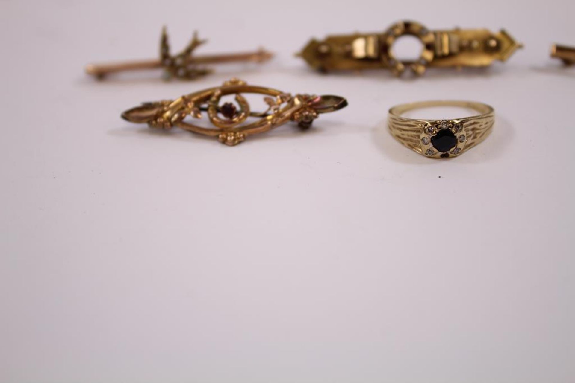 Four various 9ct Gold Brooches, Gross weight 6.7gms together with a worn Sapphire set Ring. (Est.£ - Image 2 of 6