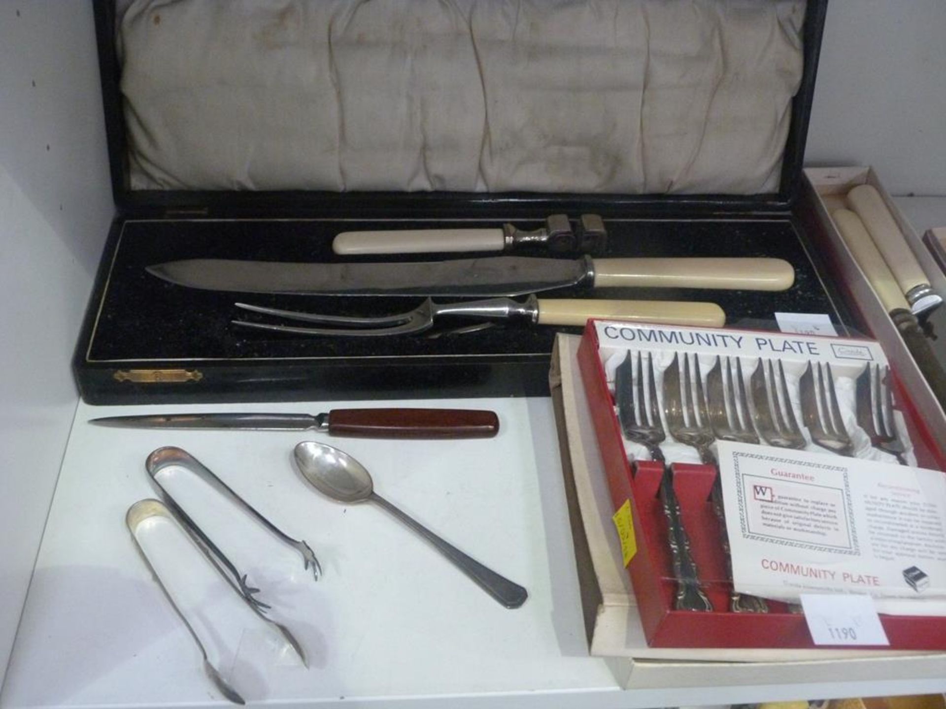 Two Shelves to contain Plated/Stainless Steel Cutlery, Also includes a Pair of Olive Tongs, Sugar - Image 4 of 5