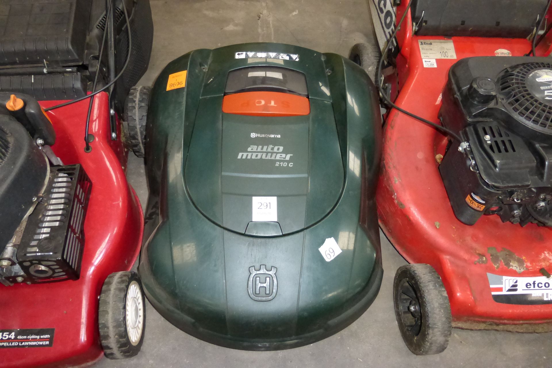 A Husqvarna Automower 210c rechargable auto Mower with 50m of new border wire