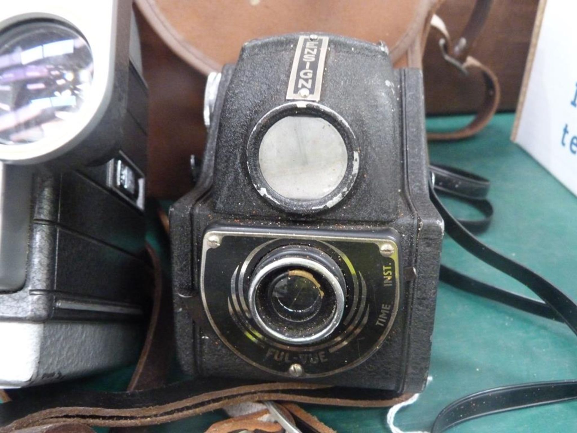 A total of four early cameras together with an early G.B Bell + Howell Hand Operated Cine Camera ( - Image 4 of 8