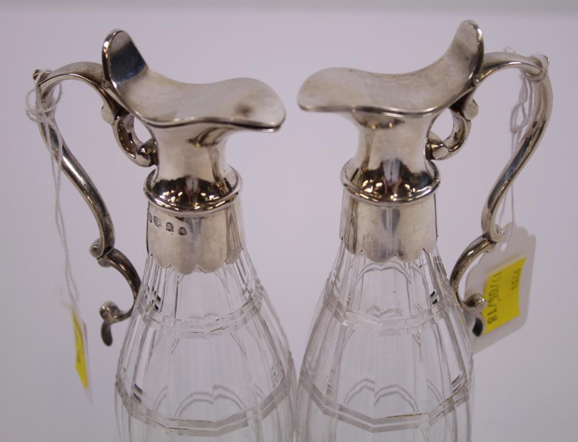 A pair of Victorian Scottish silver mounted ovoid cut glass Ewers with scroll handles and plain - Image 2 of 20