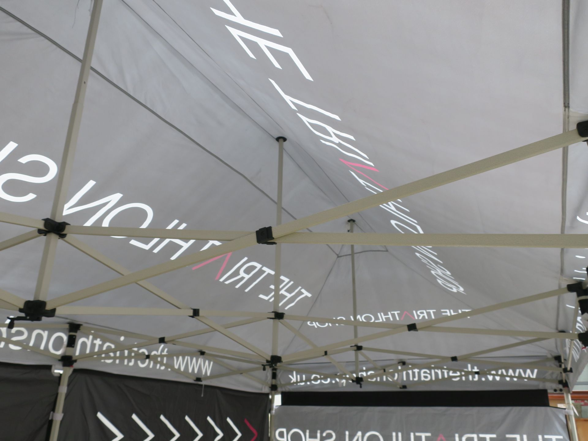 * An ABC Canopy made Event Stand/Gazebo. Please see pictures which show the graphics on the - Image 8 of 15