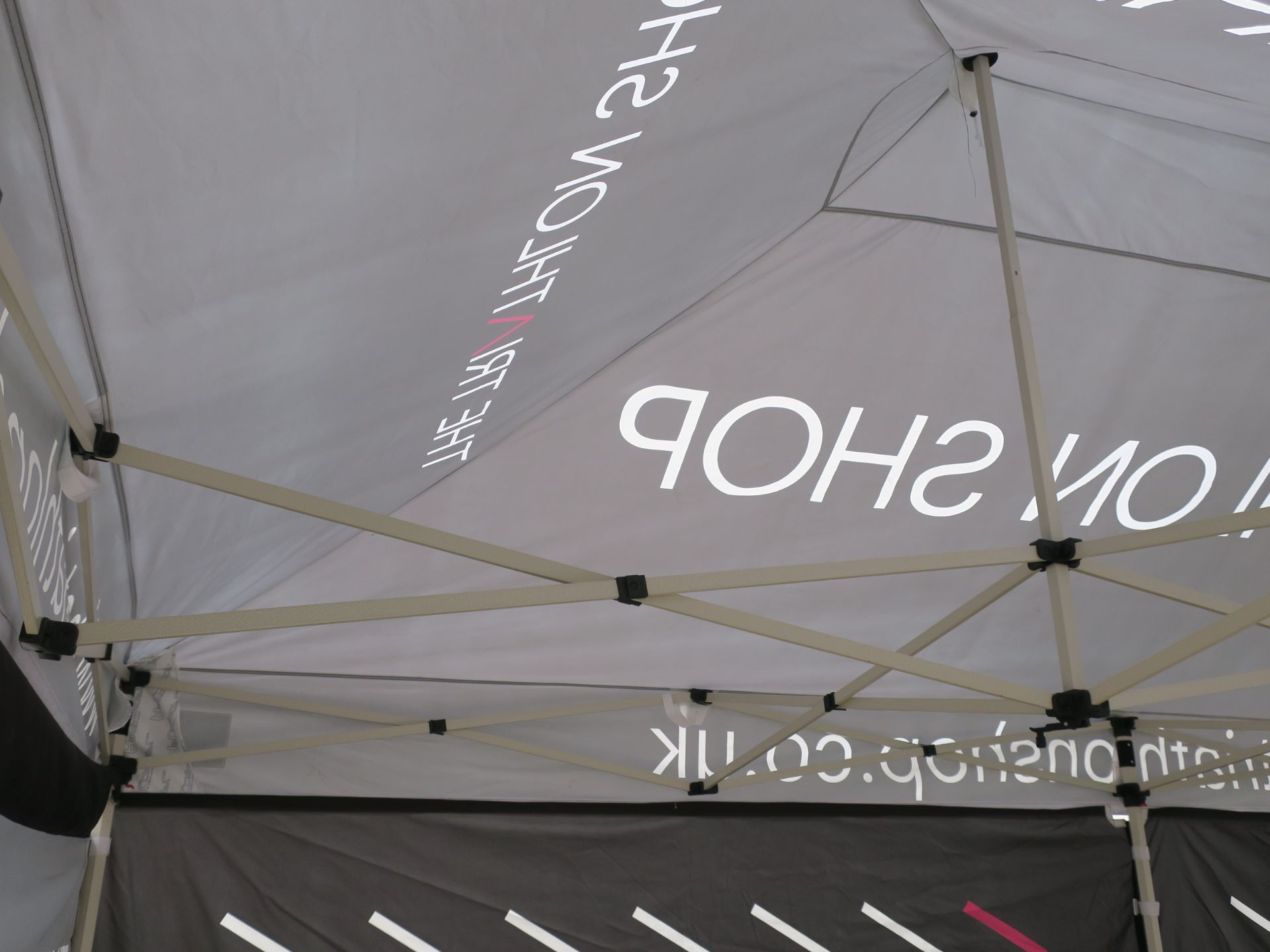 * An ABC Canopy made Event Stand/Gazebo. Please see pictures which show the graphics on the - Image 7 of 15