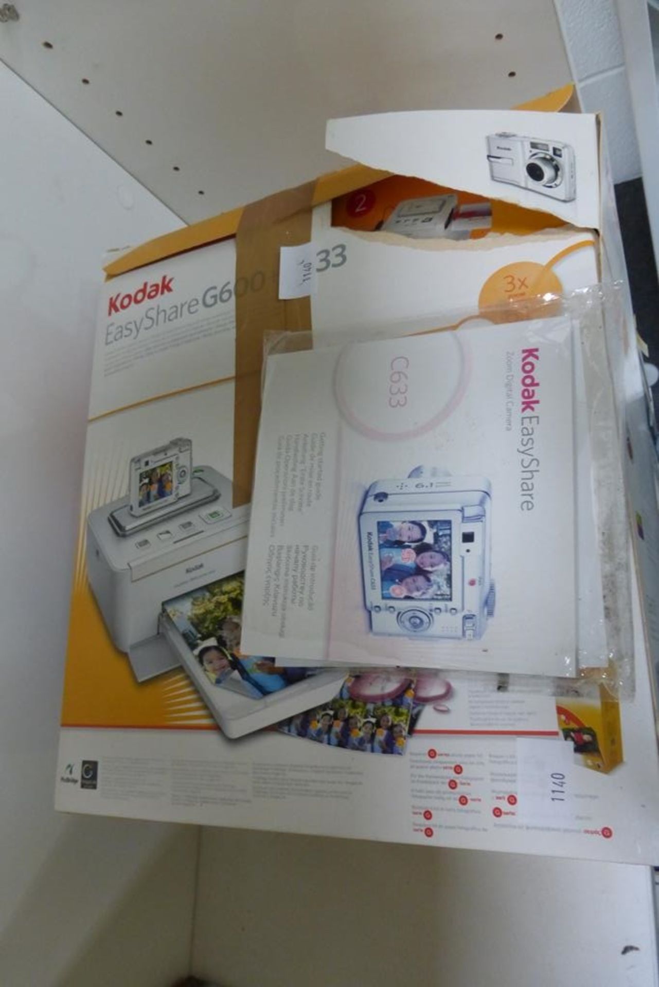 A Kodak EasyShare C633 Printer Dock and Digital Camera, with photo paper kit etc (est £20-£30)