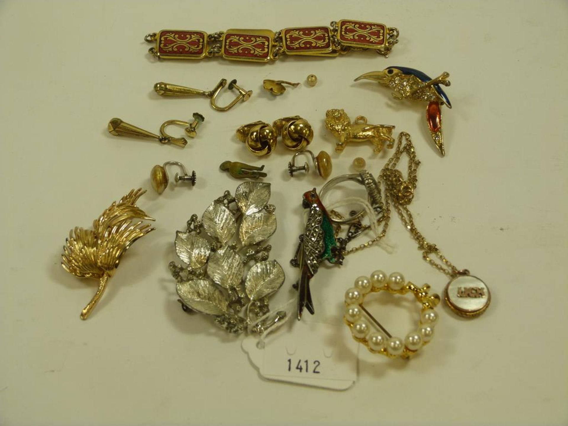 A fine 9ct Gold Chain (with pendant) a Silver and Marcasite Brooch, a Silver Ring and a small