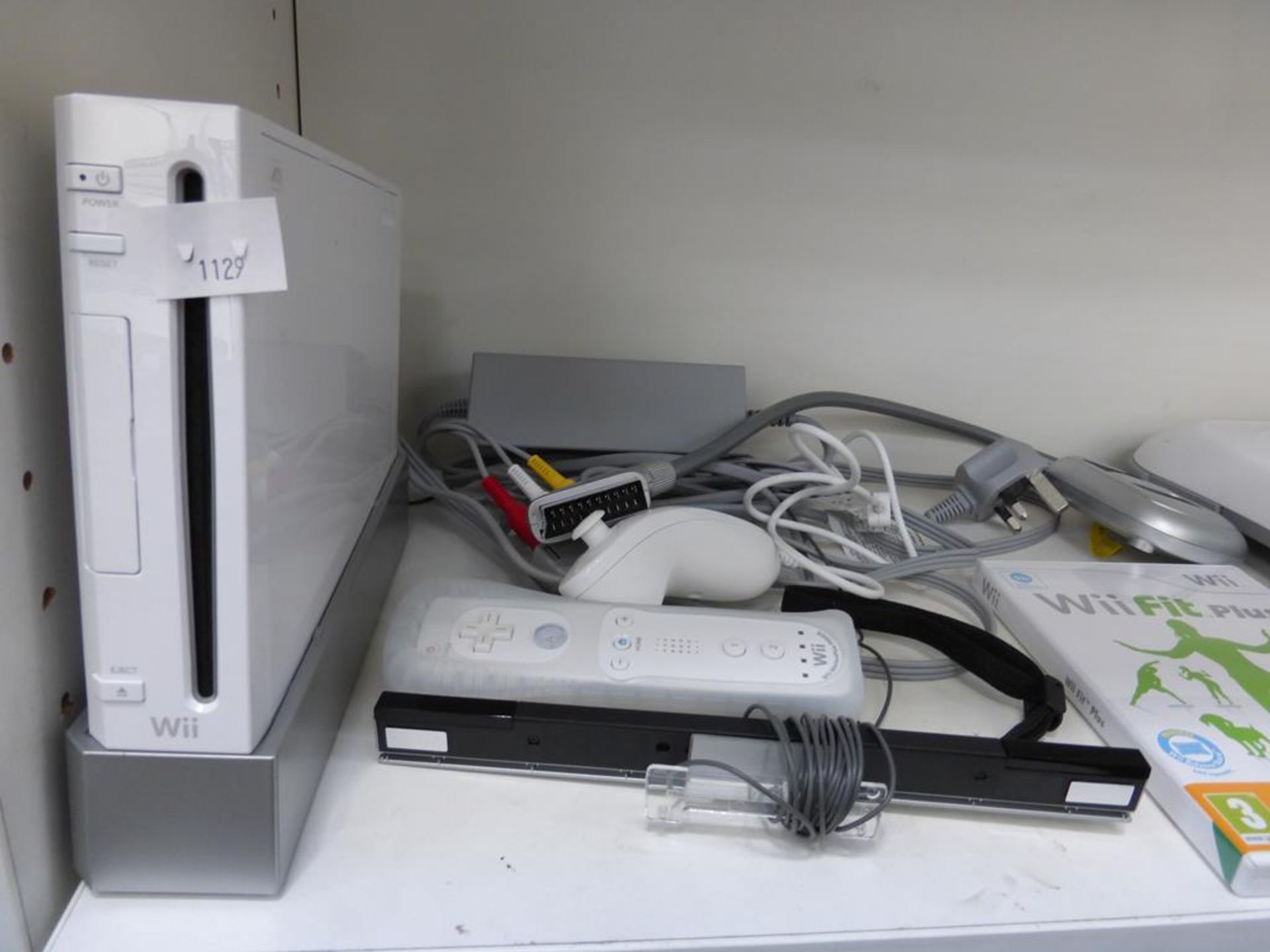 A shelf to contain a Nintendo Wii, WiiFit Board, WiiFit Plus game, Controller, Nunchuck etc (est £ - Image 2 of 3