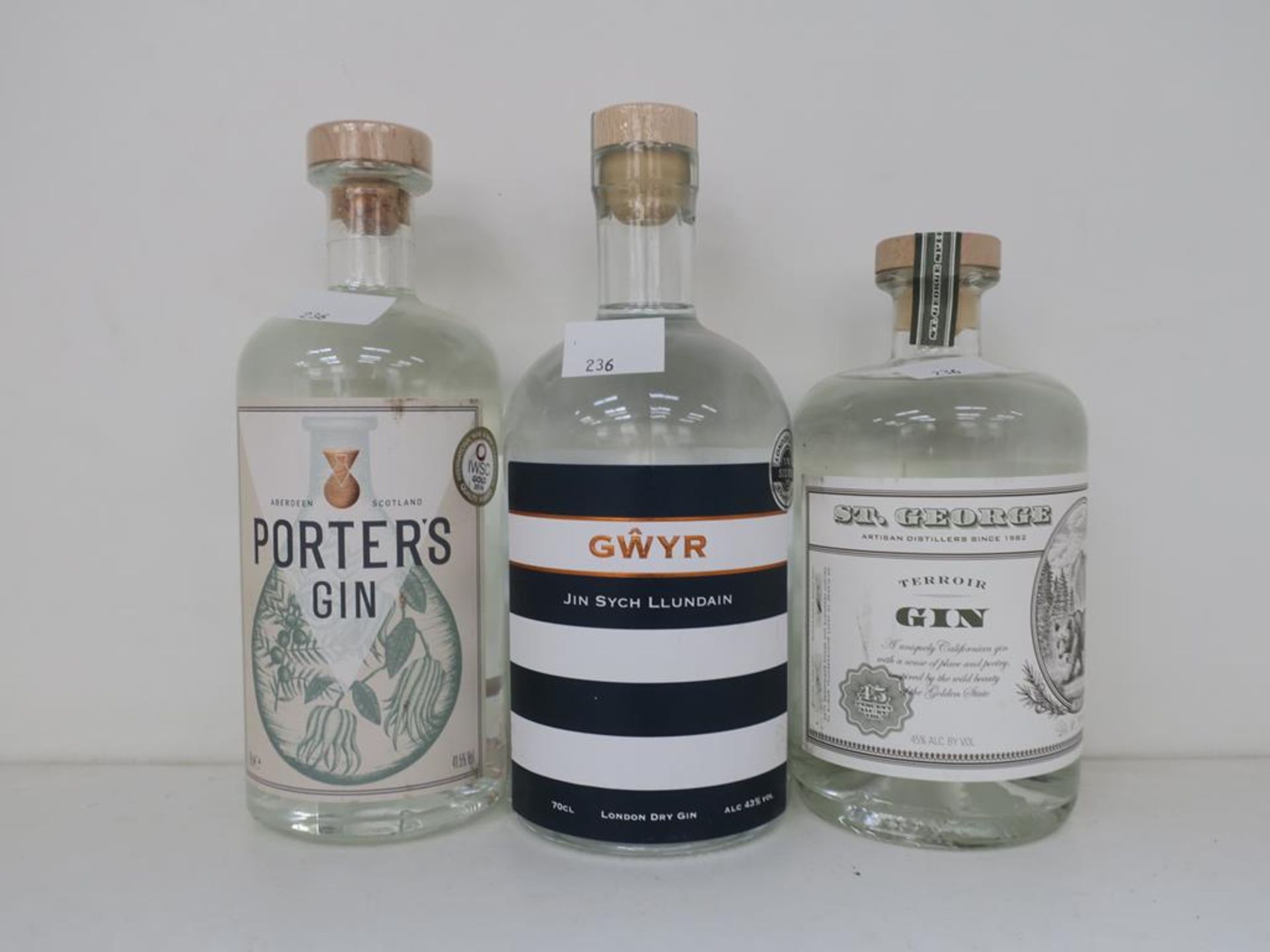 * Three bottles of Gin: a 70cl bottle of Porters Gin 41.5% vol, a 70cl bottle of St George Terroir