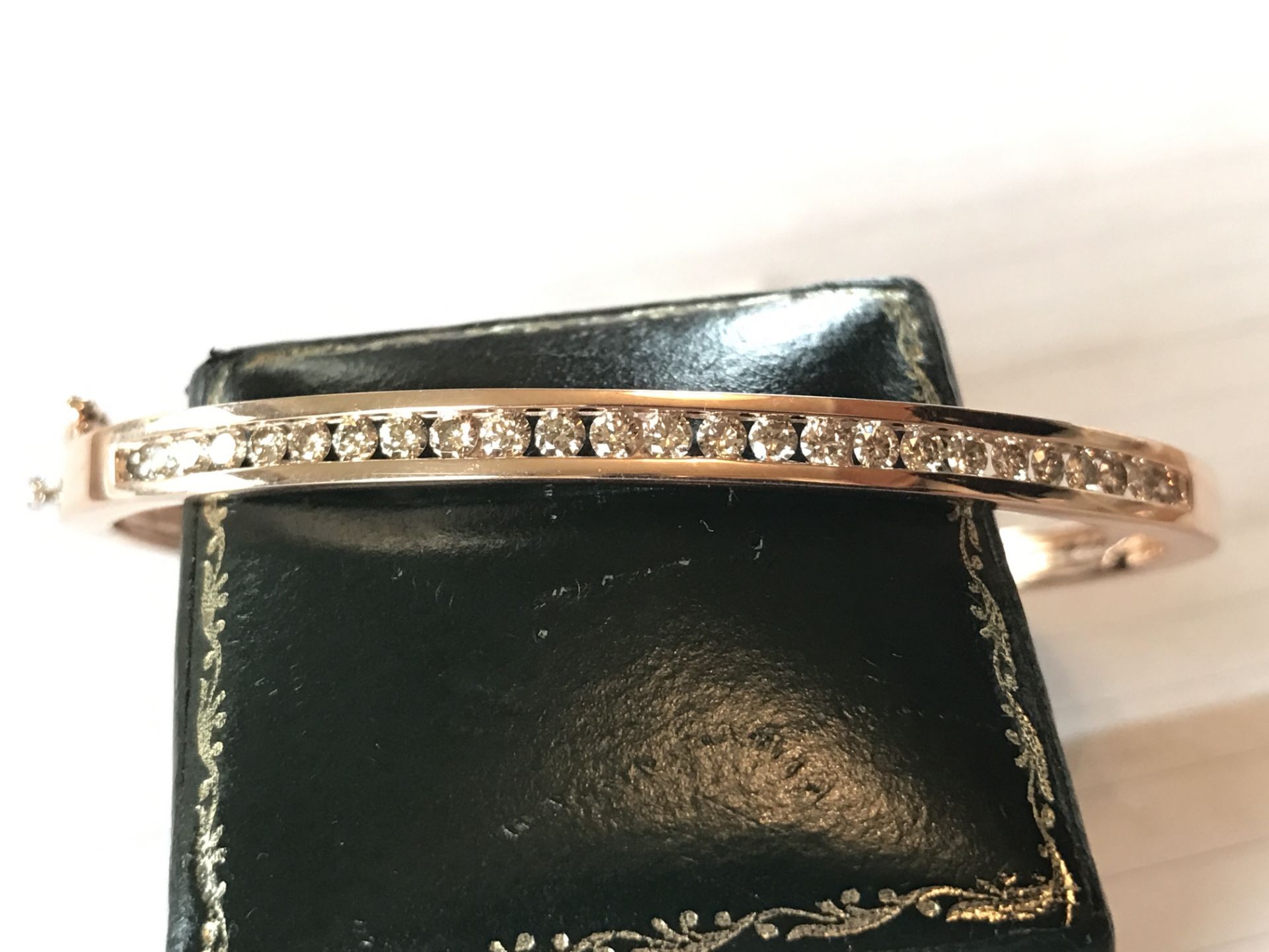 9ct ROSE GOLD HINGED CHANNEL SET DIAMOND BANGLE