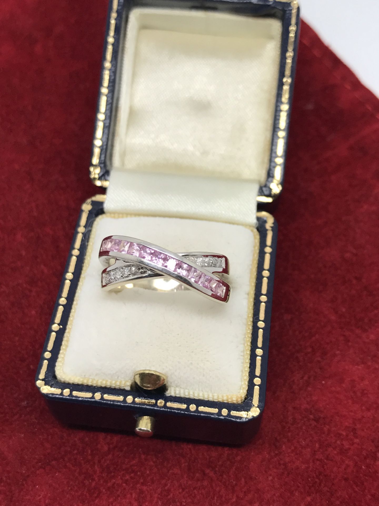 14CT WHITE GOLD PINK SAPPHIRE & DIAMOND CROSSOVER RING