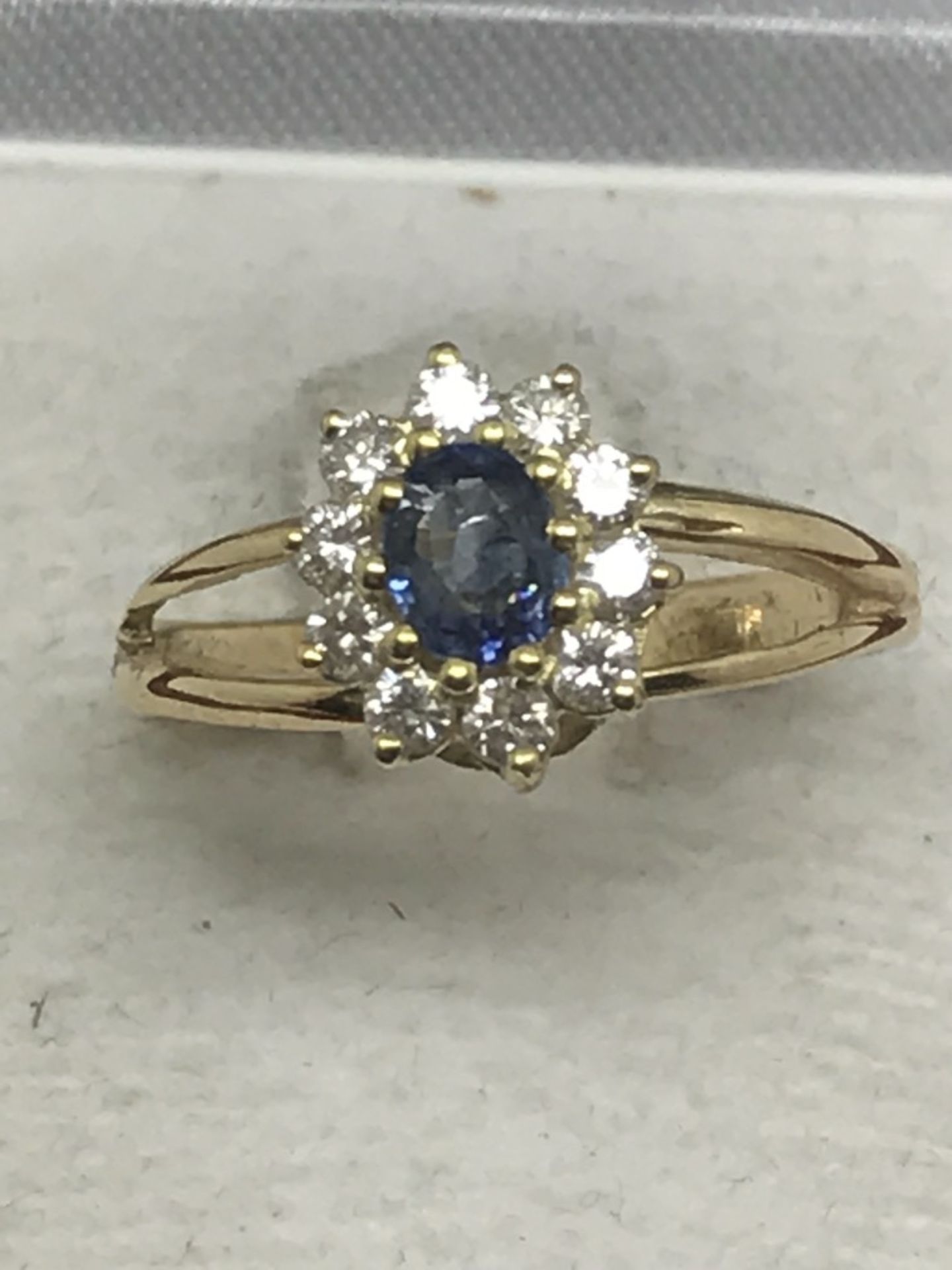 14ct GOLD RING SET WITH HIGH QUALITY SAPPHIRE SURROUNDED BY DIAMONDS - COLOUR F - VS CLARITY