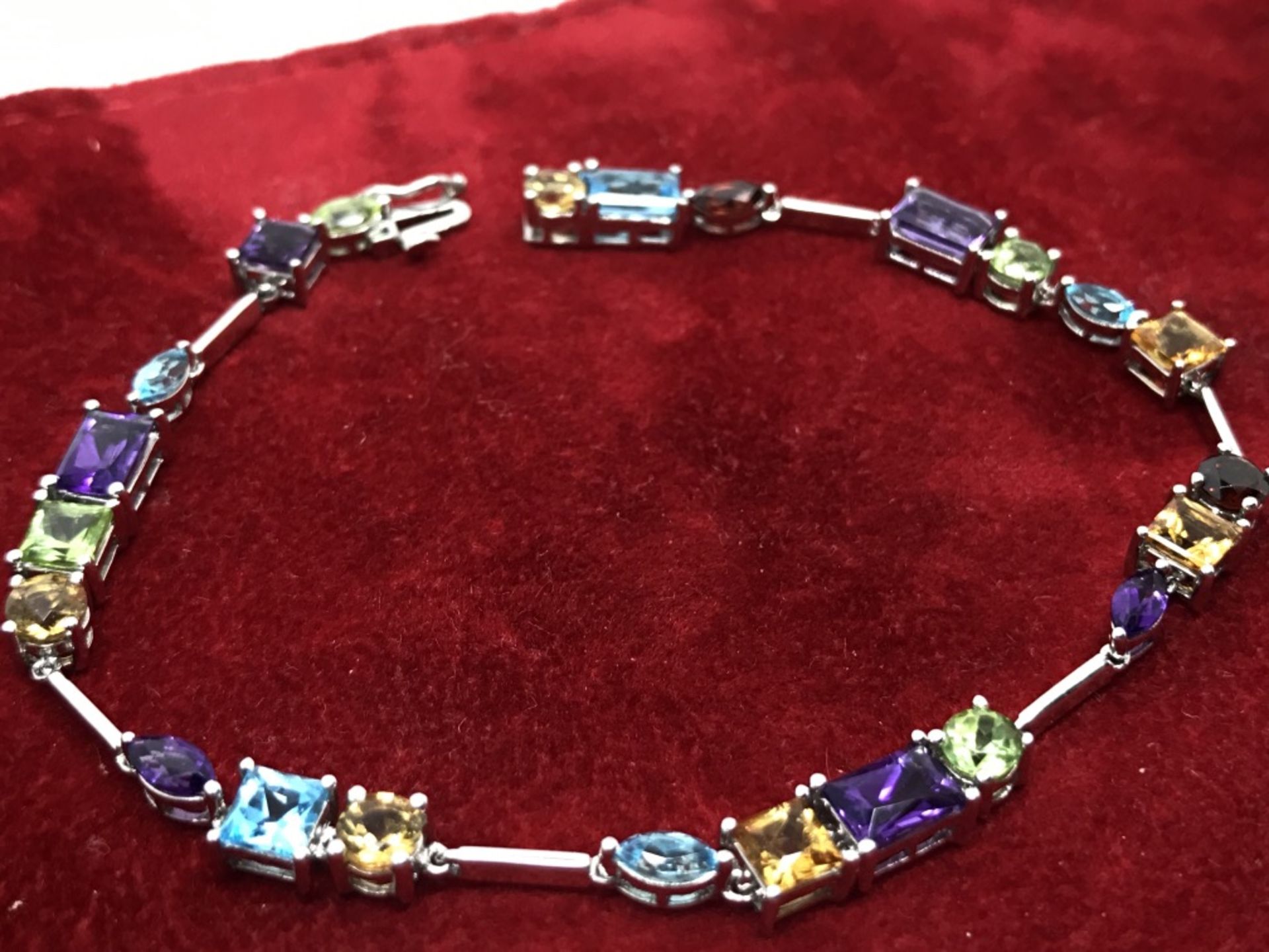 14ct WHITE GOLD AMETHYST, PERIDOT, BLUE & GOLDEN TOPAZ BRACELET