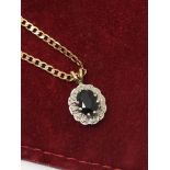 9ct GOLD SAPPHIRE & DIAMOND PENDANT WITH GOLD COLOURED CHAIN